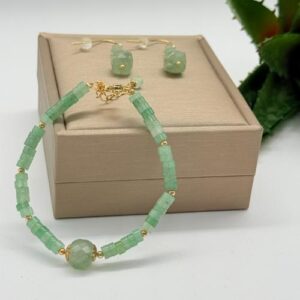 Gold plated armband en bijpassende oorbellen.